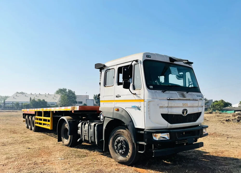 Tata flatbed trailer truck parked on a construction site